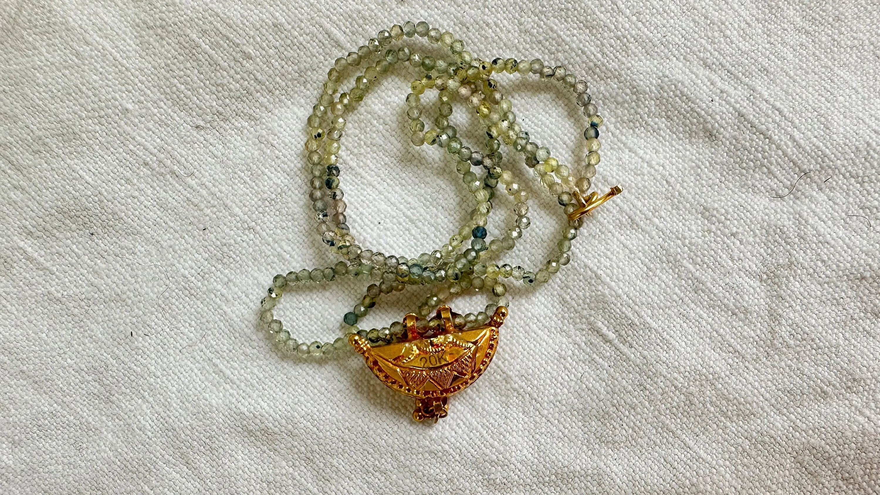 Gold Amulet & Green Sapphire Beaded Necklace. 20kt. 2074