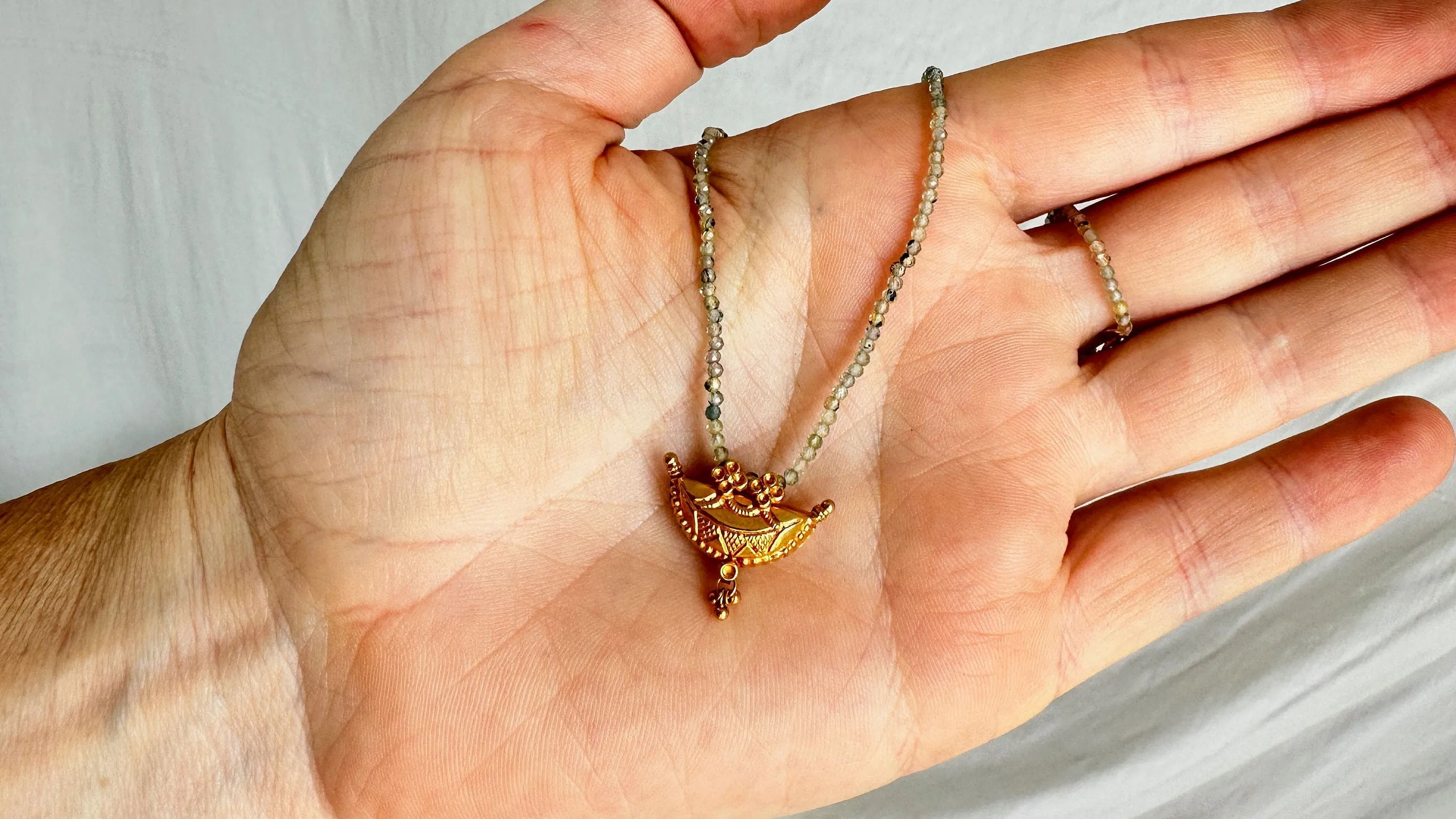 Gold Amulet & Green Sapphire Beaded Necklace. 20kt. 2074