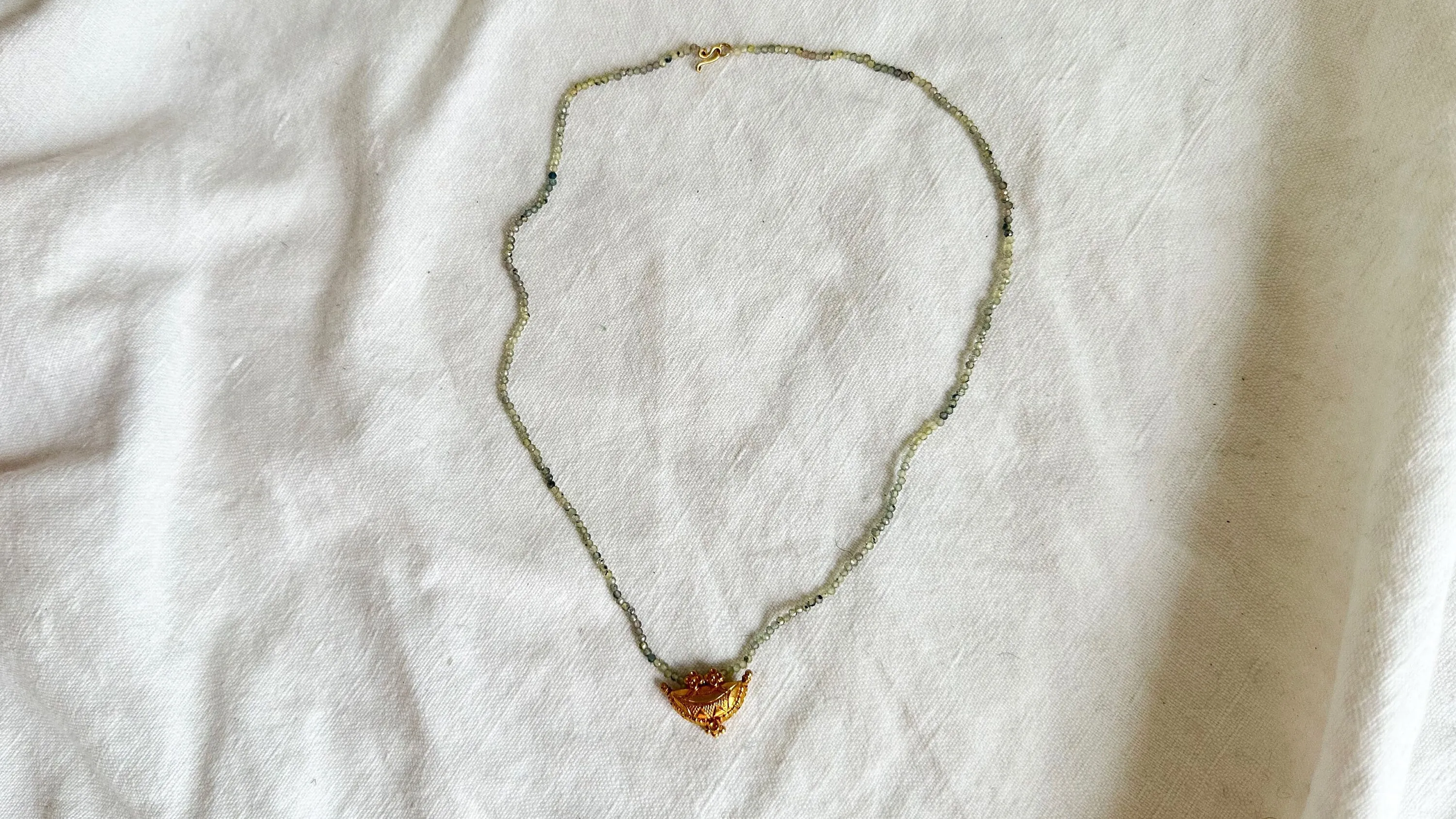 Gold Amulet & Green Sapphire Beaded Necklace. 20kt. 2074